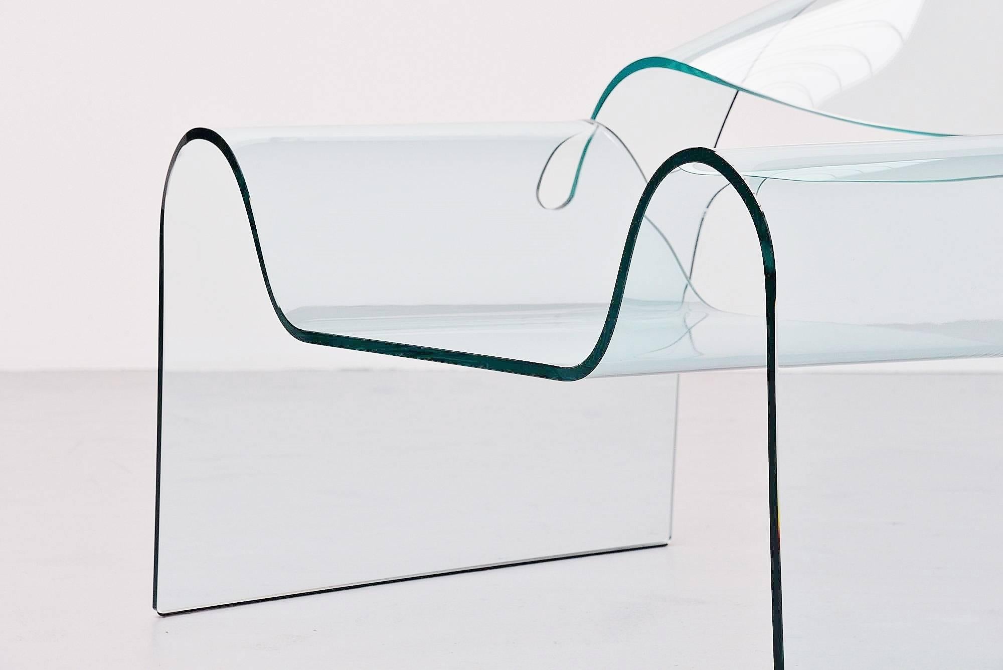 This is for the famous Ghost chair designed by Cini Boeri and Tomu Katayanagi and manufactured by Fiam, Italy, 1987. This fantastic transparent 12mm glass chair was made of thick curved & hardened glass and has a load capacity of 150 KG. This
