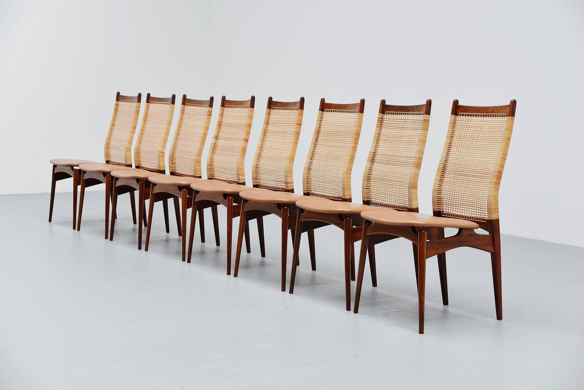 Nicely shaped dining chairs designed by Jos De Mey and manufactured by Van Den Berghe Pauvers, Belgium, 1957. The chairs are made of solid teakwood, have a cane back and light brown faux leather upholstered seats. The chairs are in good original