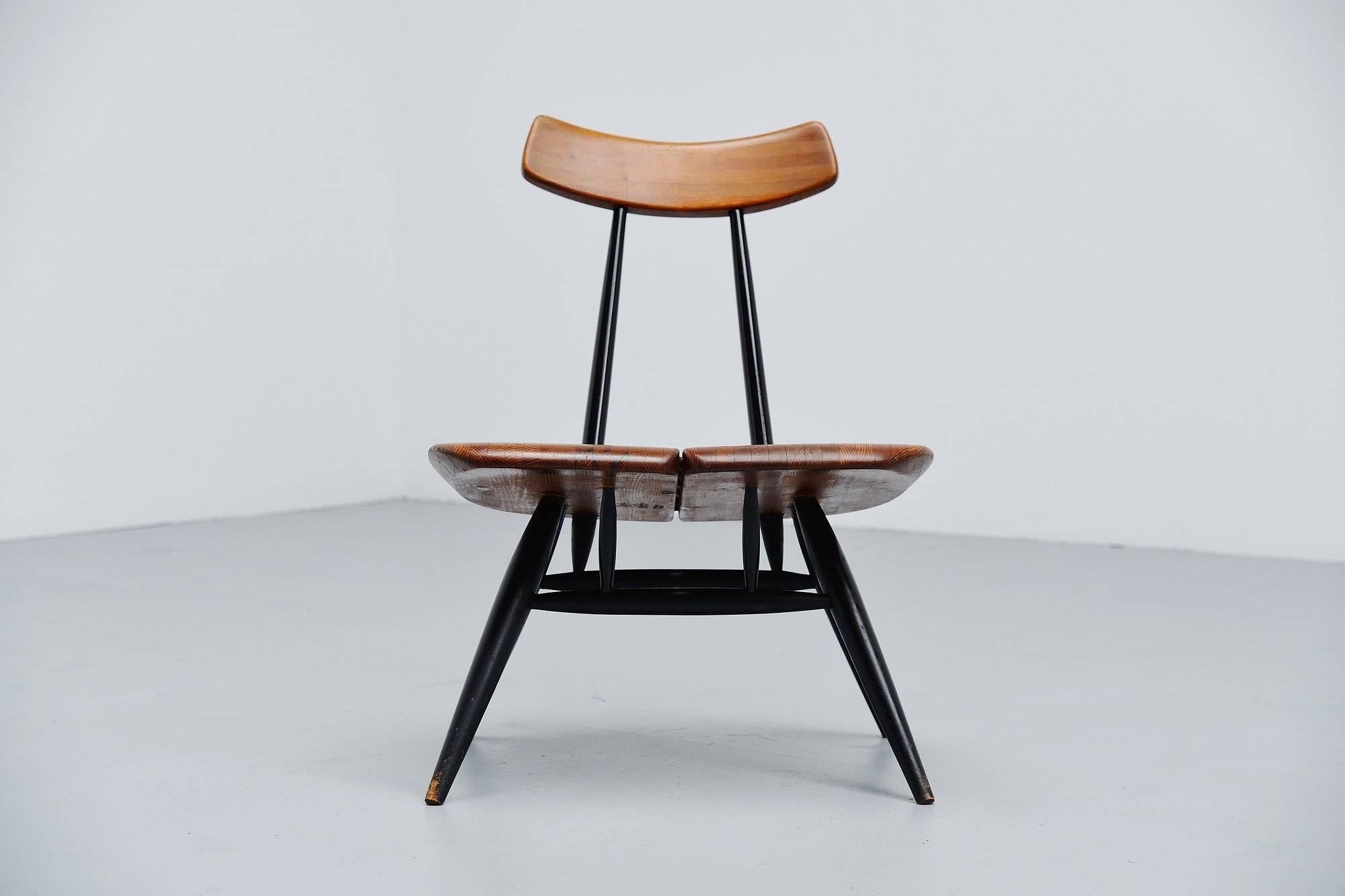 Rare Pirkka lounge chair designed by Ilmari Tapiovaara and manufactured by Laukaan Puu, Finland, 1955. This lounge chair from the Pirkka series is quite rare and its the only piece that was not put back in production. The chair has a solid pine seat