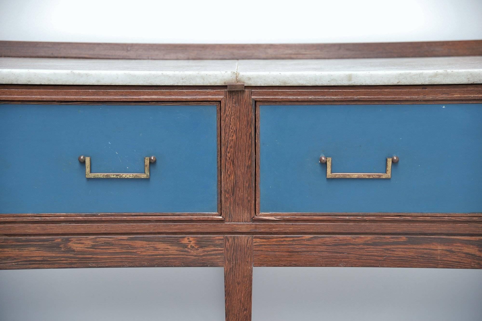 Fantastic nice and long drawer console sideboard made by unknown designer or manufacturer, Italy, 1940. The cabinet is made of wenge wood and has blue painted drawers with brass handles. The top is made of white Carrara marble and the feet are also