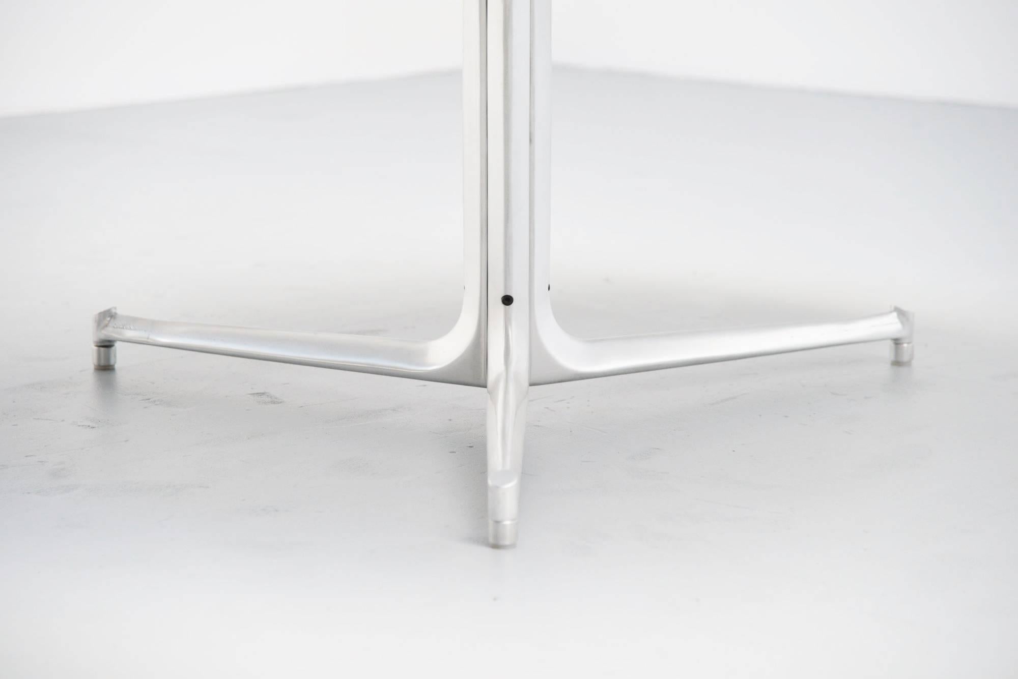 Fantastic large round dining table model T105 designed by Preben Fabricius and Jorgen Kastholm, manufactured by Kill International, Germany, 1968. This monumental table has a solid brushed steel base existing in three parts connected in the middle.