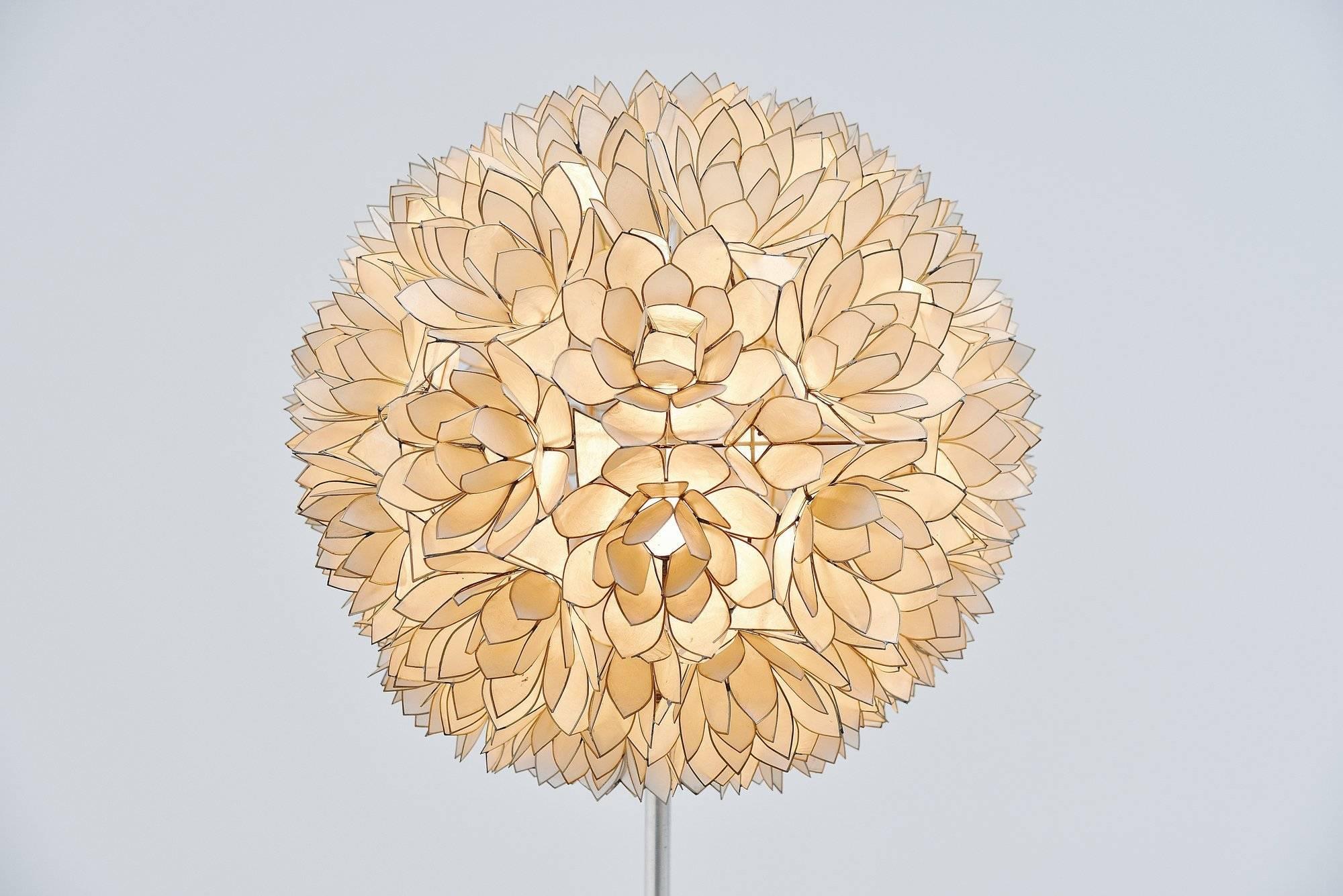 Highly decorative so called 'mother-of-pearl' floor lamp, made by unknown manufacturer or designer in Belgium, 1970. This nice and rare floor lamp has a high gloss black lacquered wooden base and a chrome plated bar with brass and pearl leaves