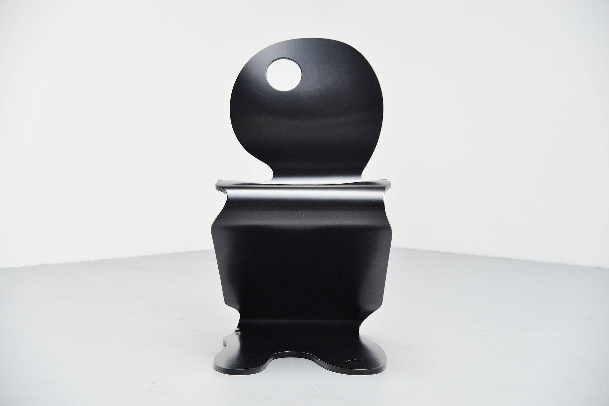 Nice plywood side chair designed by Verner Panton. This is for model Pantonic 5000 which was designed for Studio Hag, Denmark, 1992. Very nice chair in black and in excellent condition, the black color is easy to combine in every interior. This