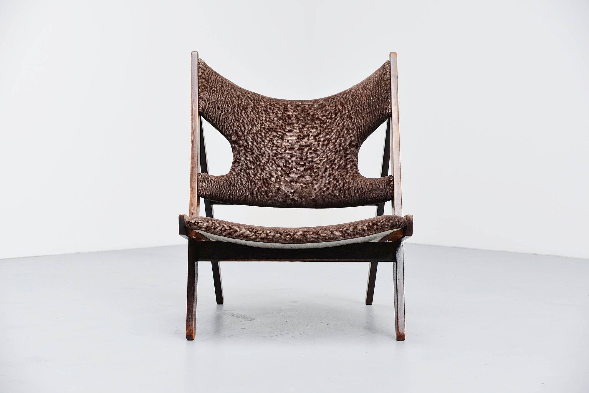 Rare so called Knitting chair designed by Ib Kofod Larsen and made by Christensen and Larsen cabinetmakers, Denmark, 1950. Only a few examples from this chair were made, makes this a very rare and hard to find piece. The example we offer on sale