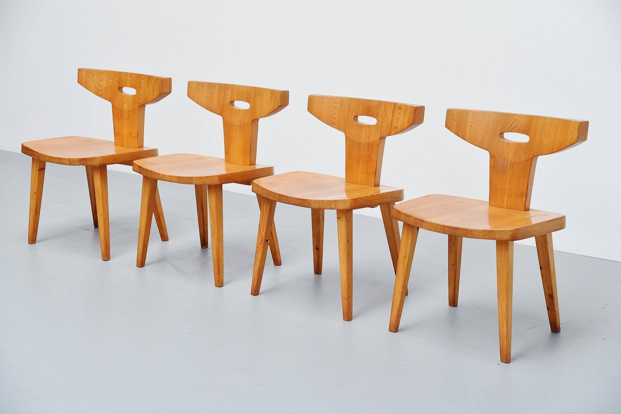 Fantastic set of four dining chairs designed by Jacob Kielland-Brandt, manufactured by I. Christiansen, Denmark 1960. The designer won the Cabinetmaker Guild price in Denmark 1960. Super hand crafted chairs and table in solid pine wood. Amazing