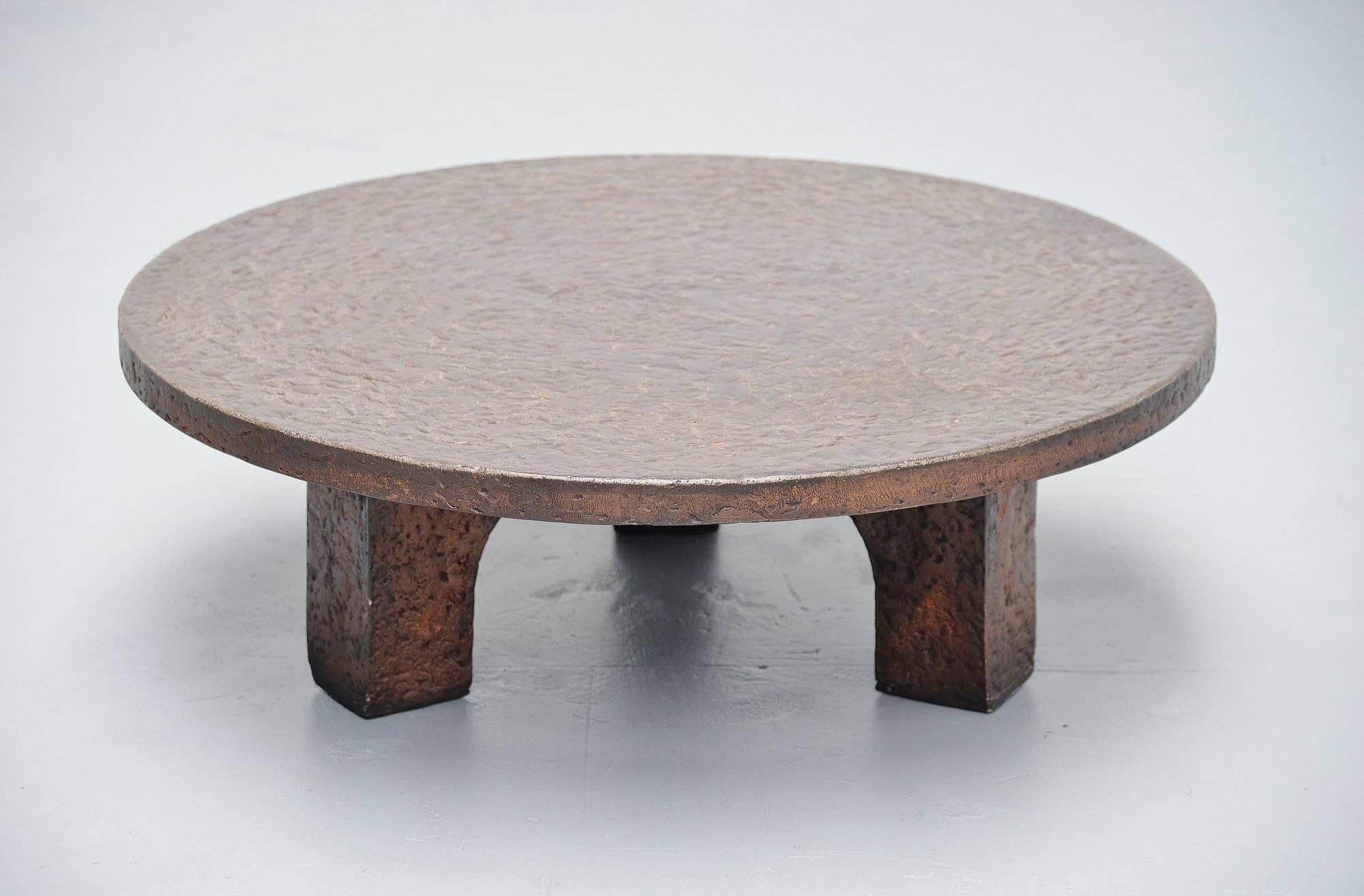 Very nice Brutalist coffee table made by unknown designer or manufacturer but in the style of Ado Chale, France 1970. This table was made of molded graphite stone and resin in brown/copper color. It’s a very nice and heavy quality table with nice