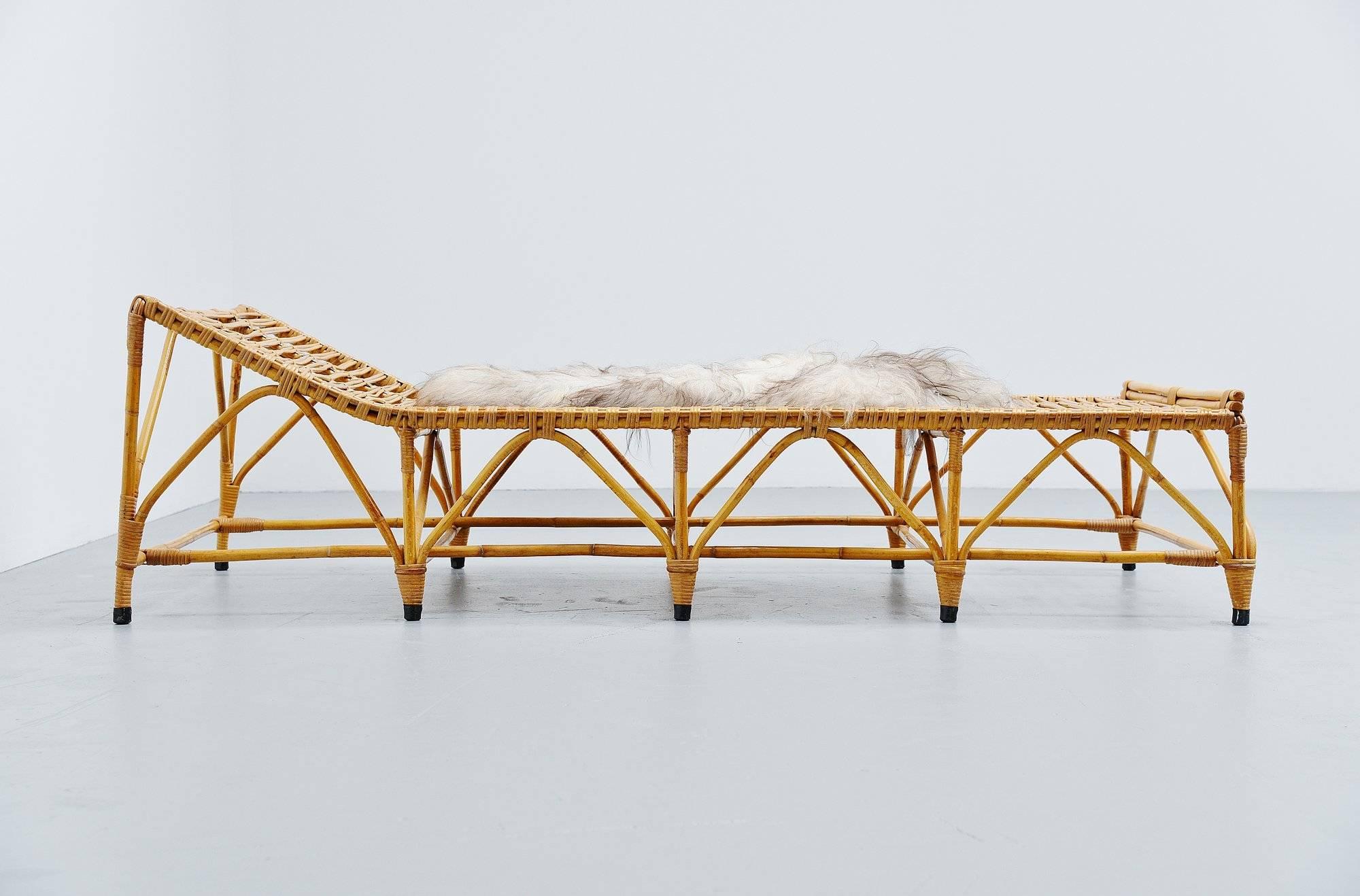 Fantastic shaped bamboo and cane daybed made by unknown designer and manufacturer. Possibly manufactured by Bonacina, Italy, 1960. The daybed has a very nice shape, it looks a but like the structure of a building at some point. The daybed is in