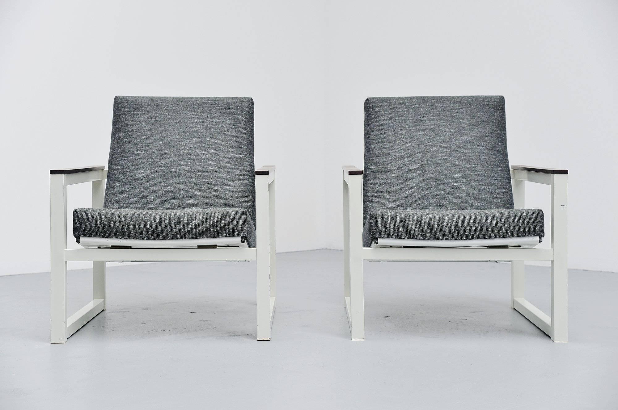 Very nice pair of Industrial lounge chairs designed by a due of Industrial designers. The chair was designed by Tjerk Reijenga for Pilastro, 1965, the seating structure was designed by Friso Kramer for Ahrend de Cirkel, 1959. The chair is also