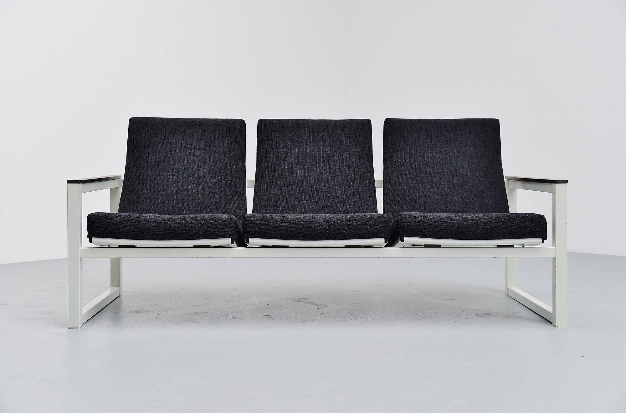 Very nice Industrial lounge sofa designed by a duo of Industrial designers. The sofa was designed by Tjerk Reijenga for Pilastro 1965, the seating structure was designed by Friso Kramer for Ahrend de Cirkel 1959. The chair is also stamped Ahrend de