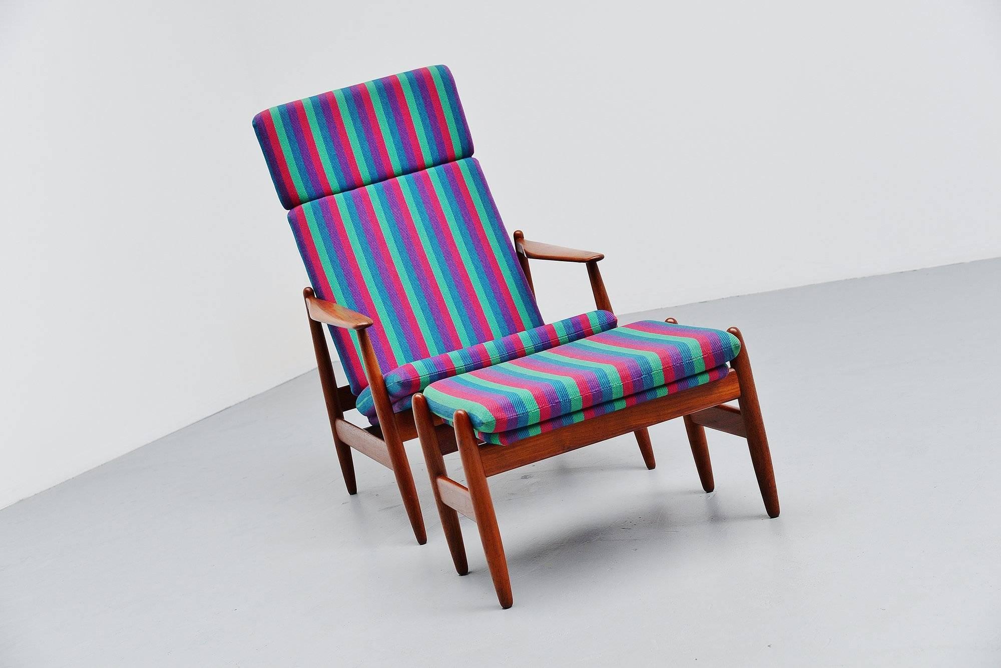 Rare lounge chair designed by Poul M. Volther and manufactured by Frem Røjle, Denmark, 1960. The chair has a solid teak wooden frame and has its original striped upholstery. The chair is in amazing condition there is only a small repair to the top