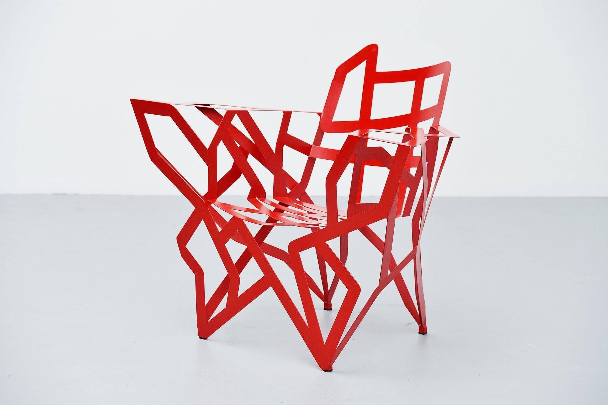 Extraordinary chair designed by Gérard Coquelin, manufactured in his own atelier in France, 1990. The chair is made of red painted metal, completely welded into perfection. Gérard Coquelin was born in 1947 and Since 1980 he designs and makes
