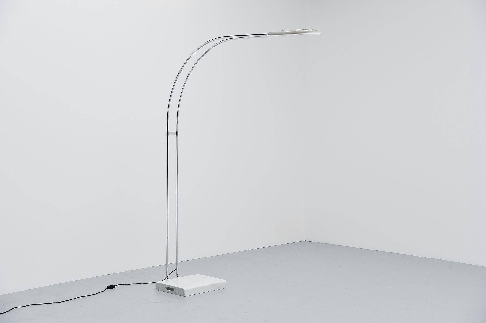 Monumental Gesto Terra floor lamp designed by Bruno Geccheling for Gruppo Skipper, Italy 1974. This rare large arc shaped floor lamp has a rectangular whit Carrara marble base and a chrome-plated tubular arm. It has a white painted shade with