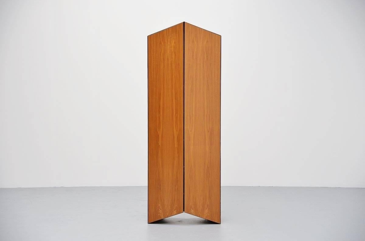 Rare limited production cabinet designed by Aldo van den Nieuwelaar for Nila Lights Tilburg, Holland 1992. Aldo worked on this angled cabinet for more than 2 years. The idea for this design was the result of a chance meeting, when his friend saw the
