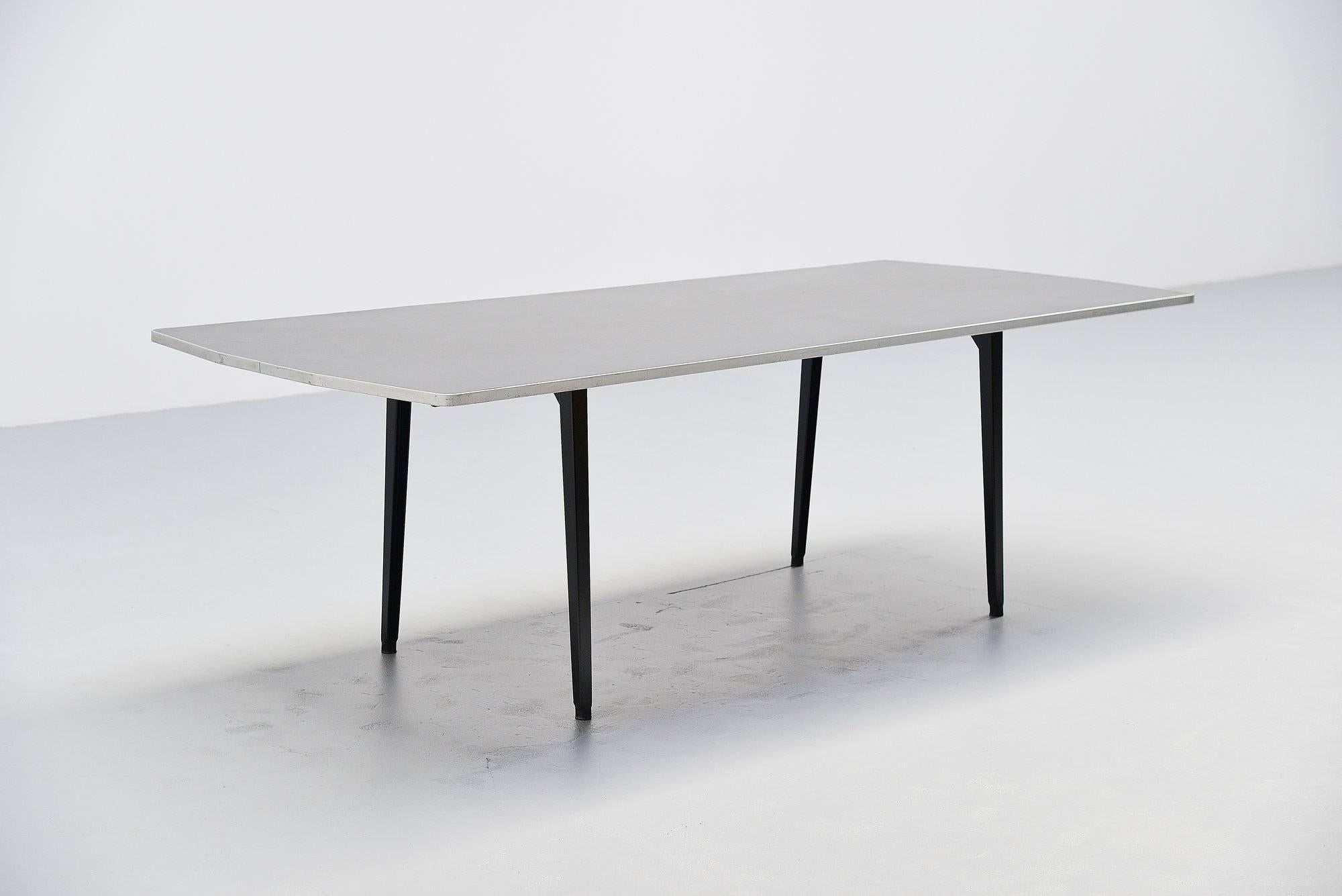 Nice and rare industrial table designed by Friso Kramer for Ahrend de Cirkel, Holland 1955. This example is from March 1962, stamped at the bottom of the table top. This table is the largest version made, 240 cm. This is the nicest version with