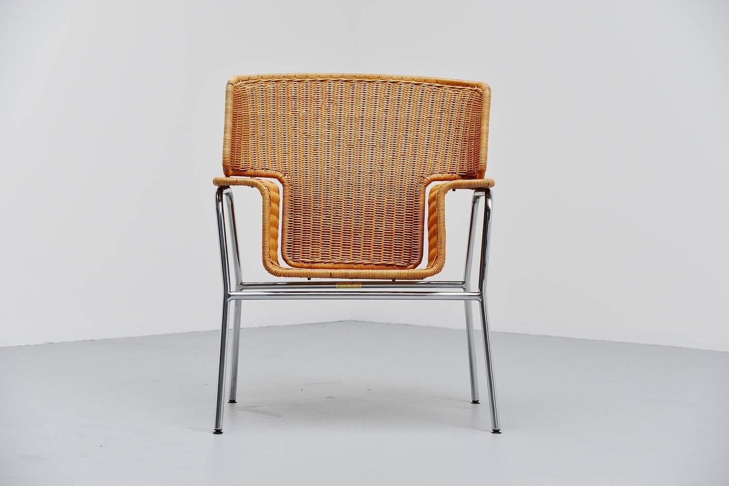 Excellent shaped armchair designed by Dirk van Sliedrecht for Rohe Noordwolde, Holland 1969. This very nice modernist shaped armchair has an unusual shape but therefor its a very special chair. The frame is made of brushed steel and the seat is made