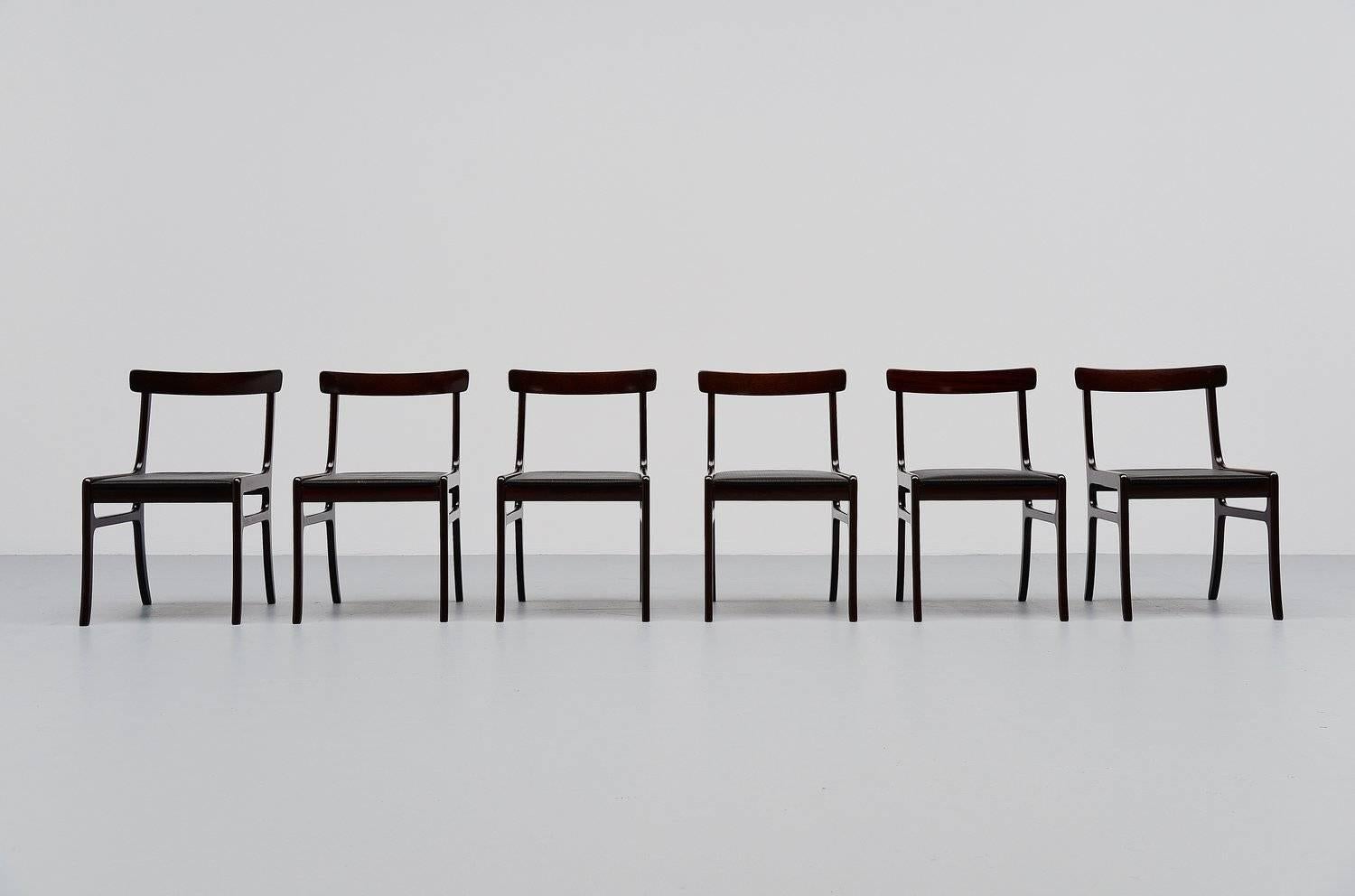 Fantastic set of 6 dining chairs designed by Ole Wanscher for Poul Jeppesen, Denmark 1950. Tese chairs are from the  Rungstedlund series and are made of solid mahogany wood and these examples still have there original very dark brown nearly black