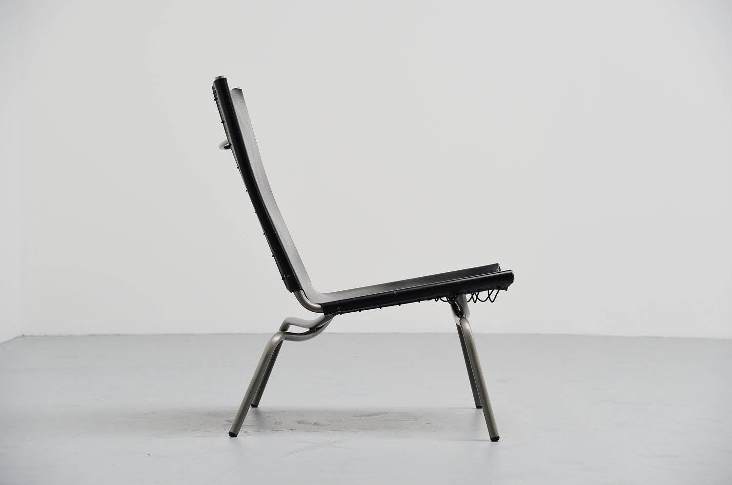 Very nice early example of the crossed legs chair designed by Fabiaan van Severen in his own atelier, Belgium 1998. This chair was purchased very short after the release of this chair in 1998, so a very early production. The chair has a grey coated