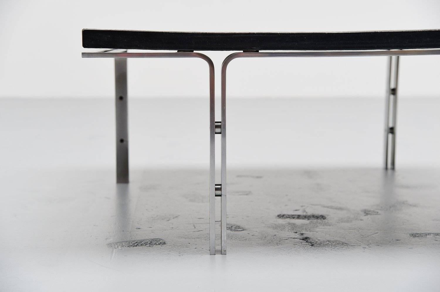 Very nice modernist coffee table designed by Horst Brüning for Kill International, Germany 1969. This very nice heavy quality coffee table has a solid metal matt chrome plated frame and a very heavy solid slate top in dark grey, close to black. The