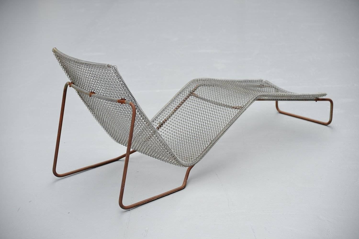 Very nice lounge chair designed by Niall O'Flynn for 't Spectrum, Holland 1997. This fantastic shaped lounge chair was in the collection of 't Spectrum from 1997-2001. I don't think many of these were made as I have rarely seen one. Very nice shaped