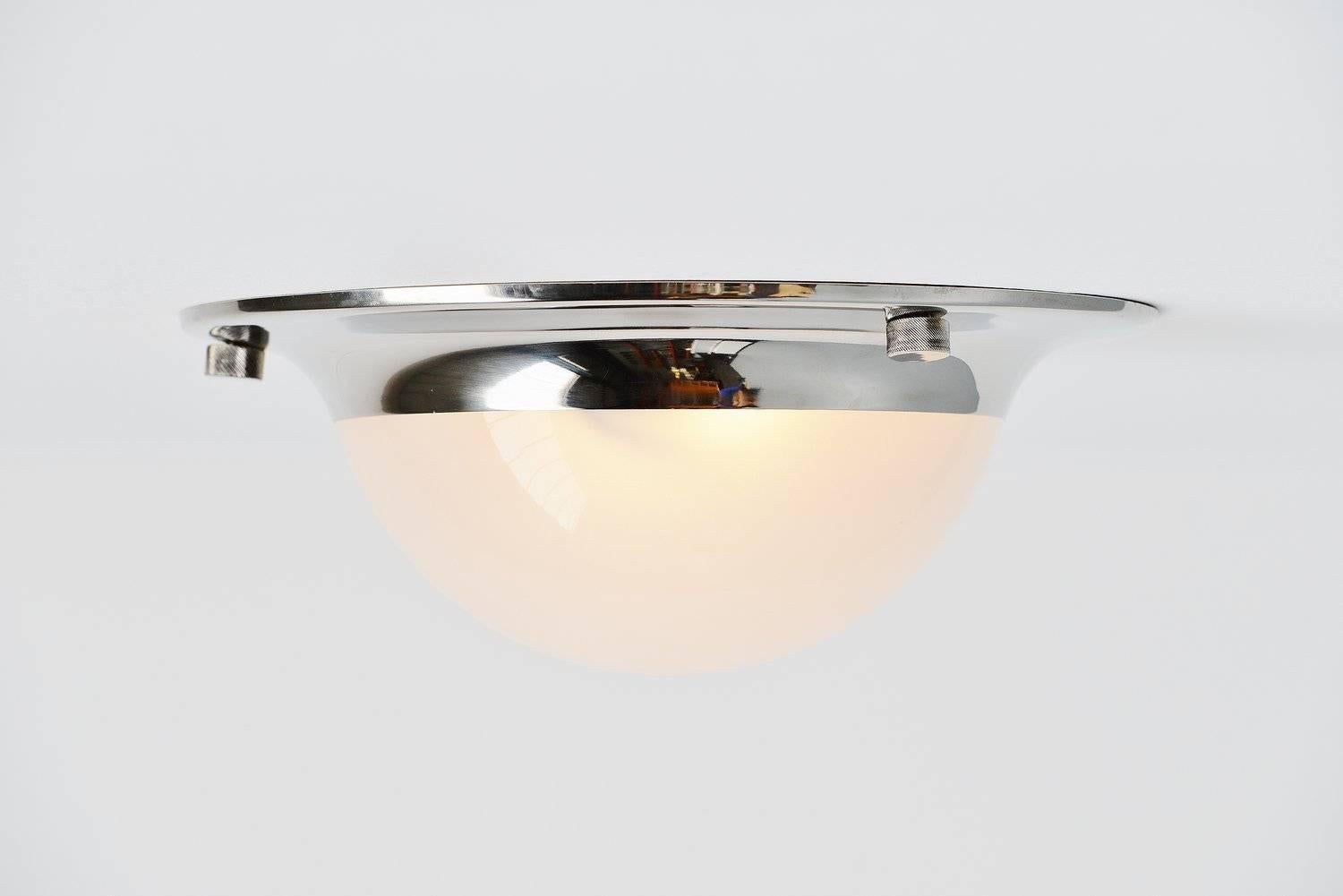 Nice ceiling or wall lamp model (Tommy) LSP6 designed by Luigi Caccia Dominioni for Azucena, Italy, 1965. This is for a lamp that can be used as flush mount ceiling lamp or wall lamp. The lamp has a chrome plated metal structure and glass frosted