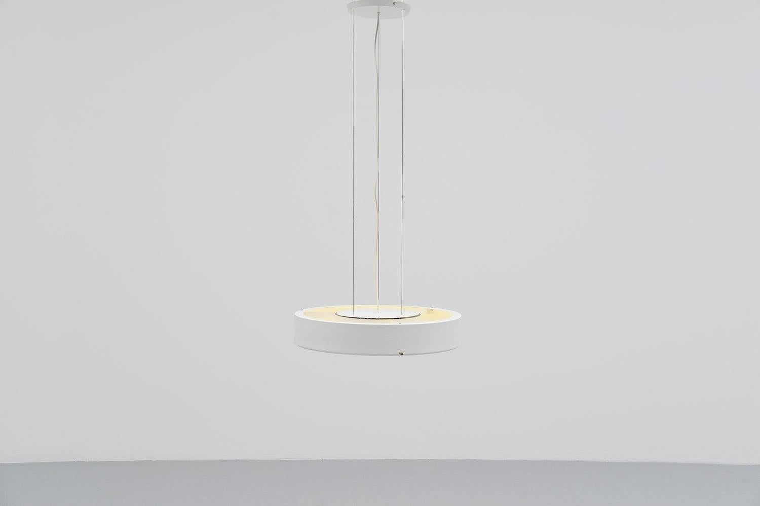 Nice large ceiling fixture model 288 designed by Bruno Gatta for Stilnovo, Italy, 1960. This lamp has a white lacquered metal shade with glass opaline glass diffuser shade. The lamp hangs on three metal wires and uses six PL lamps. It gives very