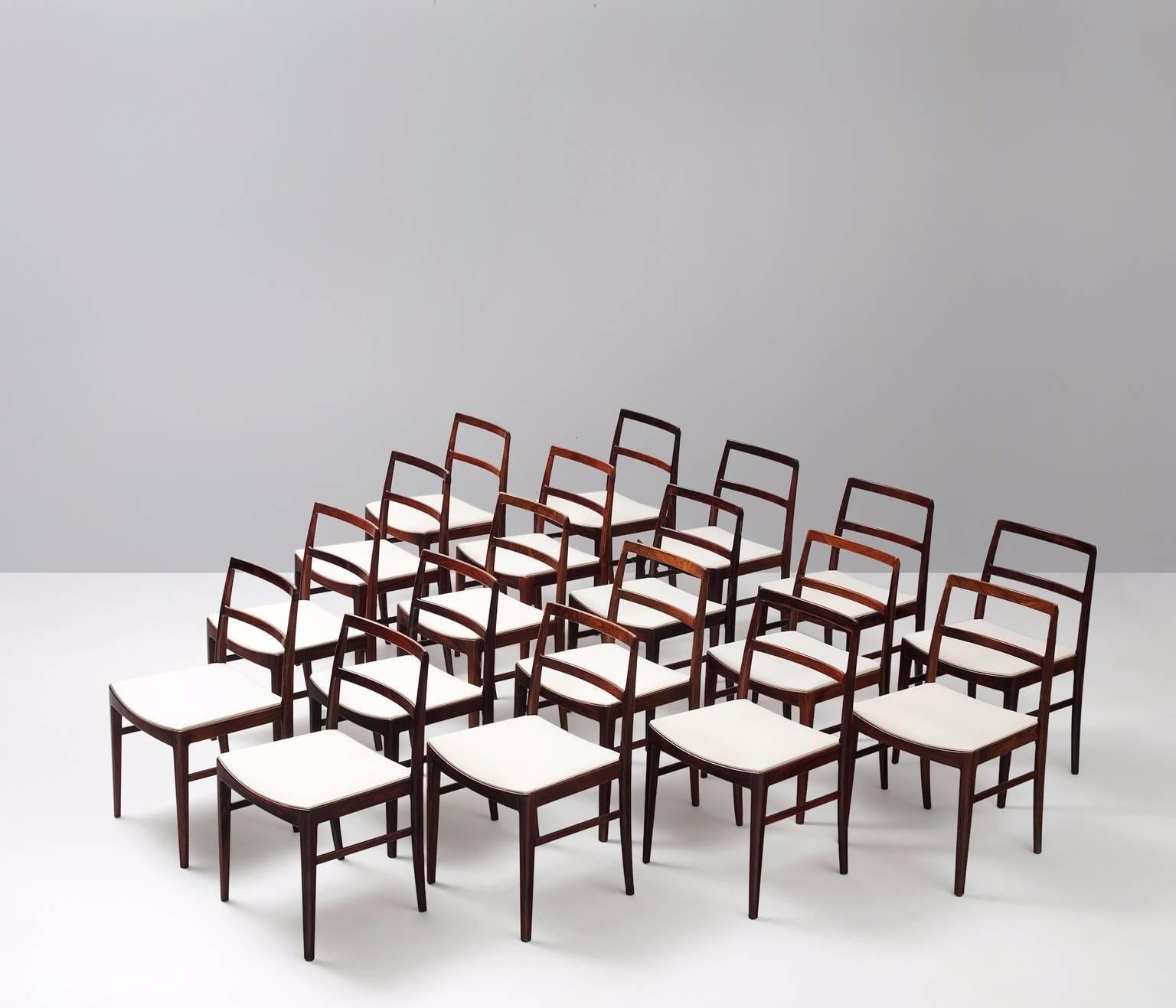 Set of 18 dining chairs, model '430,' rosewood and fabric, Arne Vodder for Sibast Møbler, Denmark 1960s. 

Large set of 18 dining chairs by the great Danish designer Arne Vodder. Modest and elegant chairs with rosewood frame. The basic and linear
