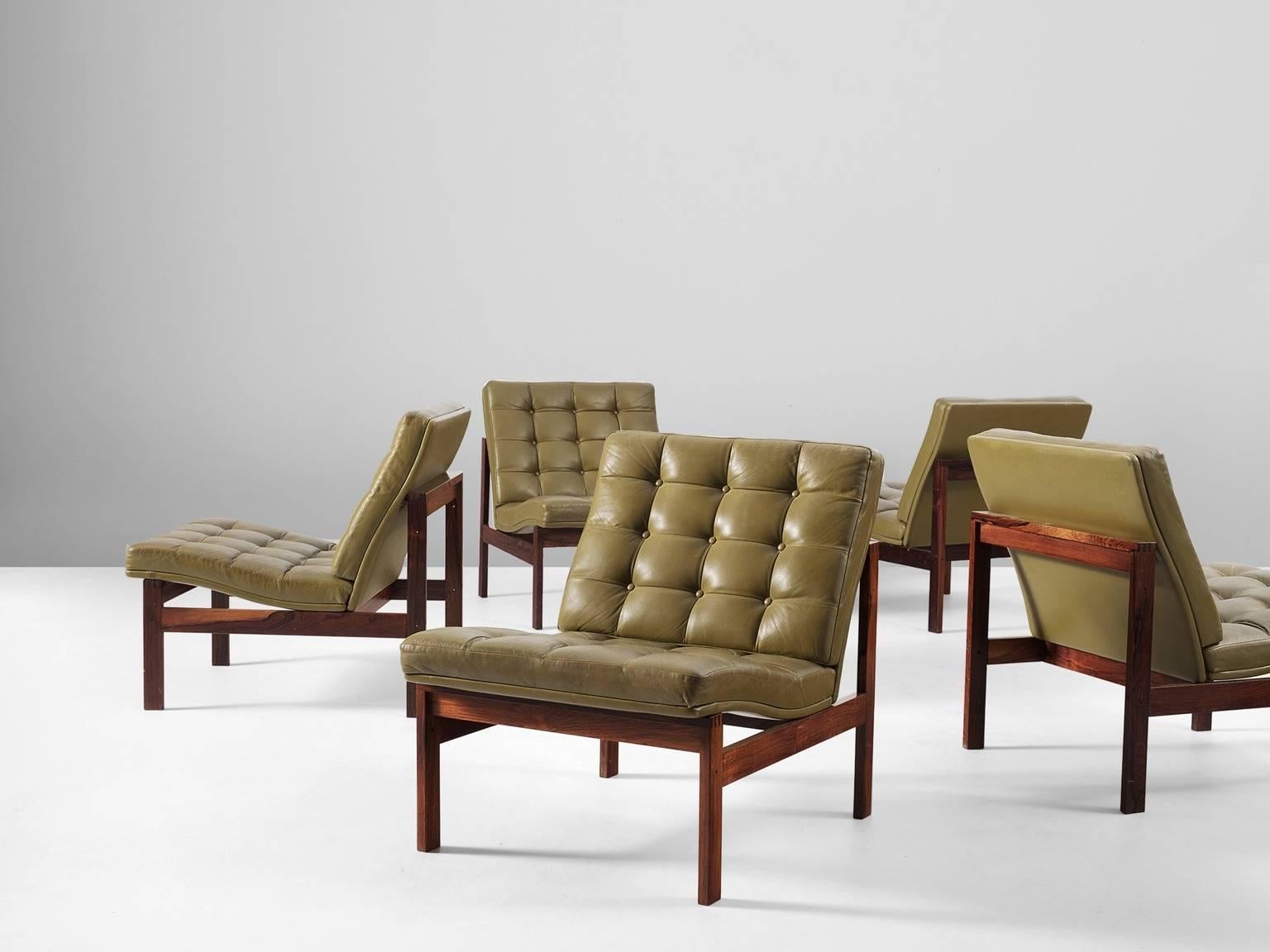 Set of five modular easy chairs, in rosewood and leather, by Ole Gjerløv-Knudsen & Torben Lind for France & Søn, Denmark, 1962.

Modern and beautiful colored set of five modular easy chairs. These chairs have a tight and simple design. The