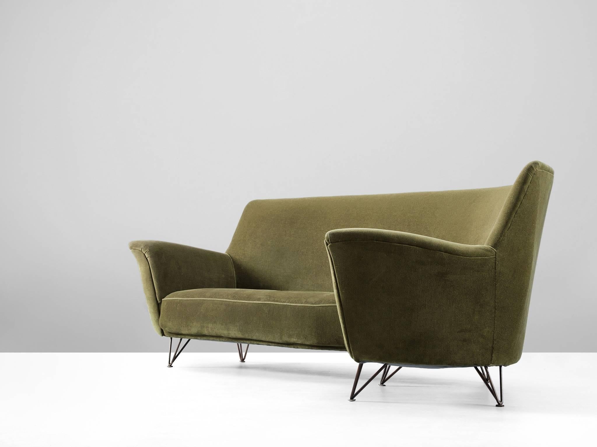 Sofa, in fabric and metal, by Ico Parisi, Italy 1950s. 

Highly refined sofa in green velvet. The sofa is gently curved and shows a variety of well designed sharp lines which provide the sofa with an uncommon yet elegant look. Highly comfortable