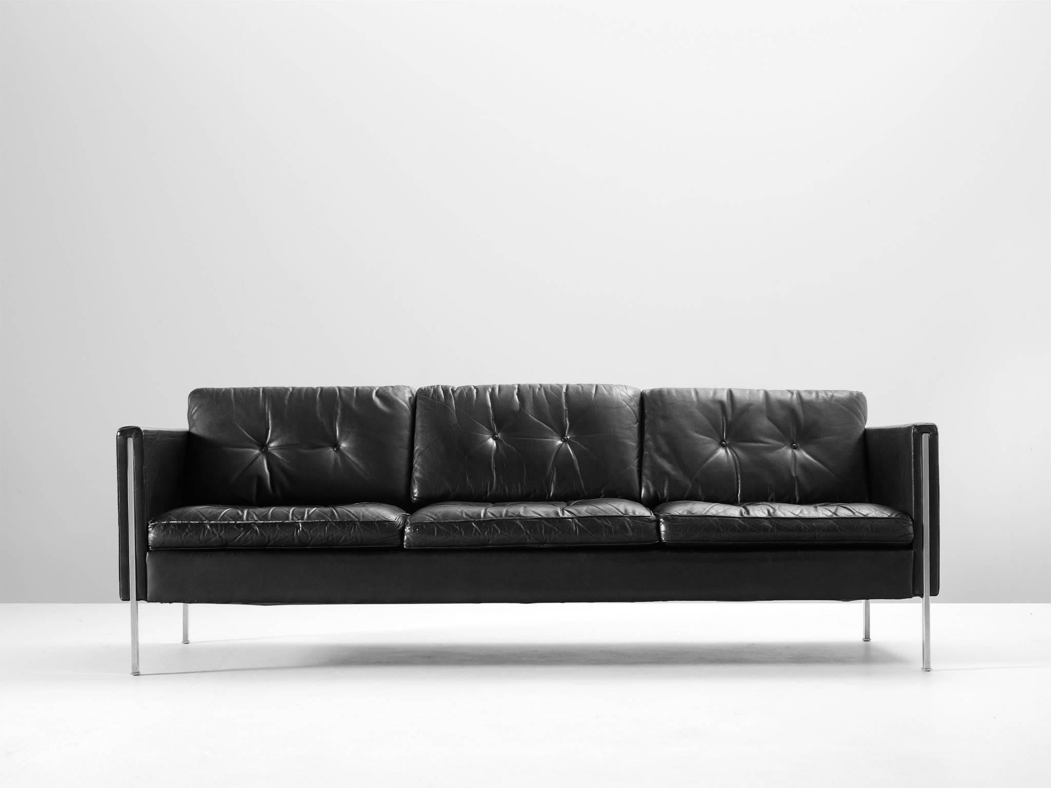 Sofa model '442/3', in leather and steel by Pierre Paulin for Artifort, the Netherlands 1962. 

This comfortable three-seat sofa shows elegant steel details. The combination of steel and leather gives this sofa it's modern and sophisticated look.