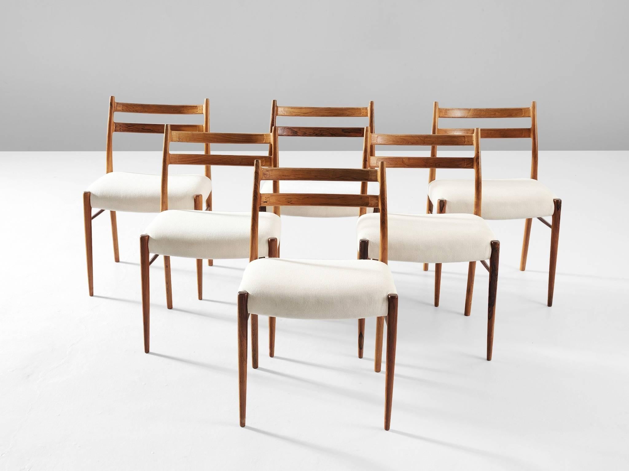 Set of six chairs model GS710, in rosewood and fabric by Arne Wahl Iversen for Glyngore Stolefabrik, Denmark, 1960s. 

Very elegant set of six dining chairs by Danish designer Arne Wahl Iversen. The rosewood frame has a fragile, yet highly