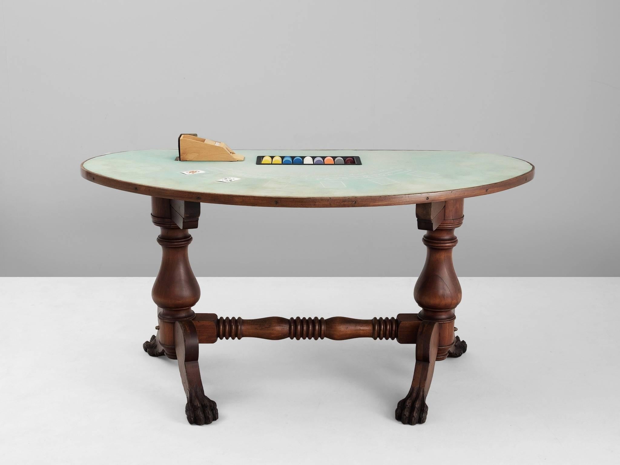 Game table, in mahogany, brass and fabric, United States, 1940s.

A beautiful antique American mahogany blackjack table in its original condition. Complete with original cardholder. The wooden frame is highly detailed and shows great