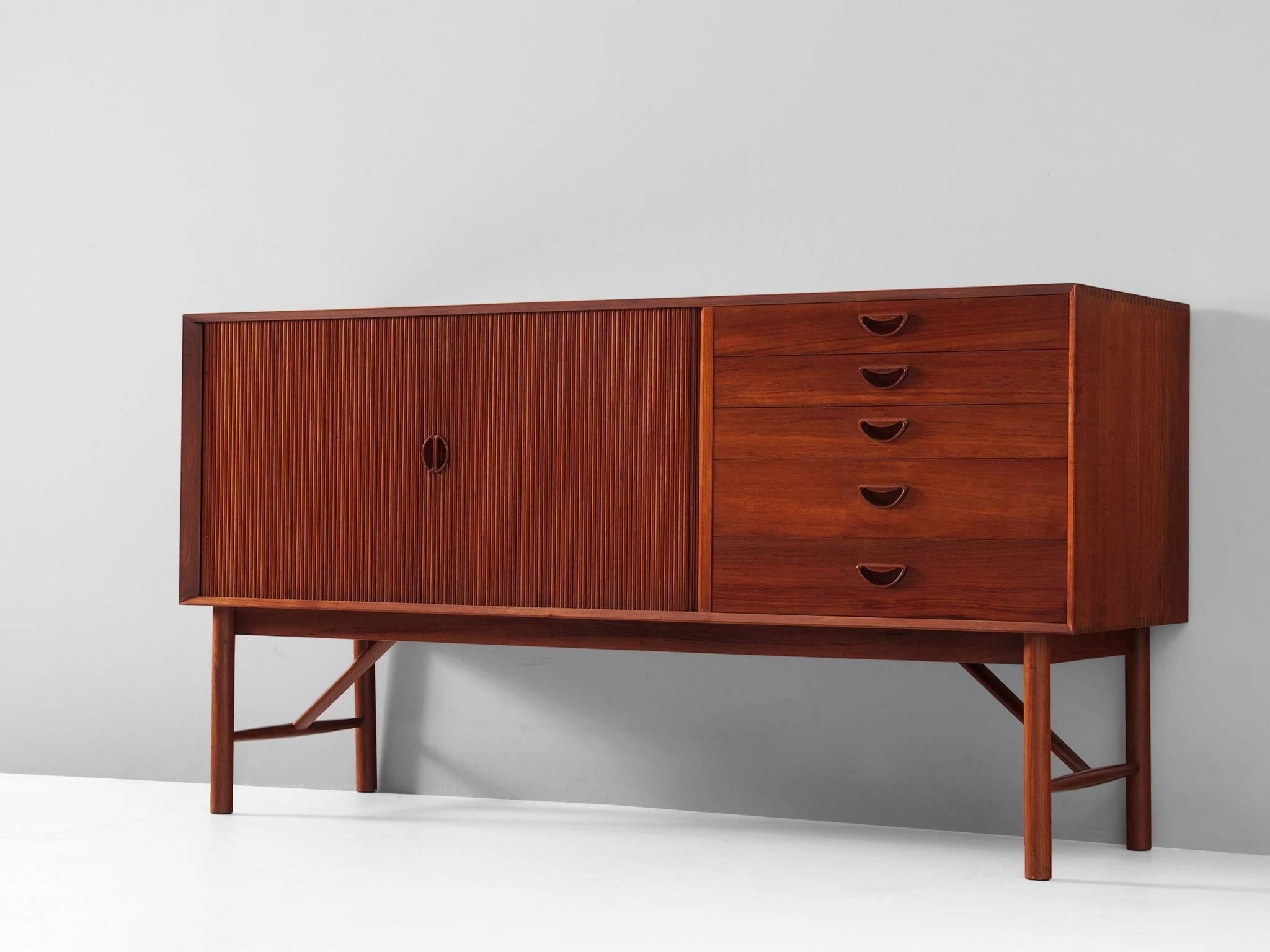 Sideboard, in teak, by Peter Hvidt & Orla Mølgaard Nielsen for Soborg Møbelfabrik, Denmark, 1959.

High quality and fine designed credenza in teak by Danish designer duo Peter Hvidt and Orla Mølgaard Nielsen. This cabinet shows beautiful detailed