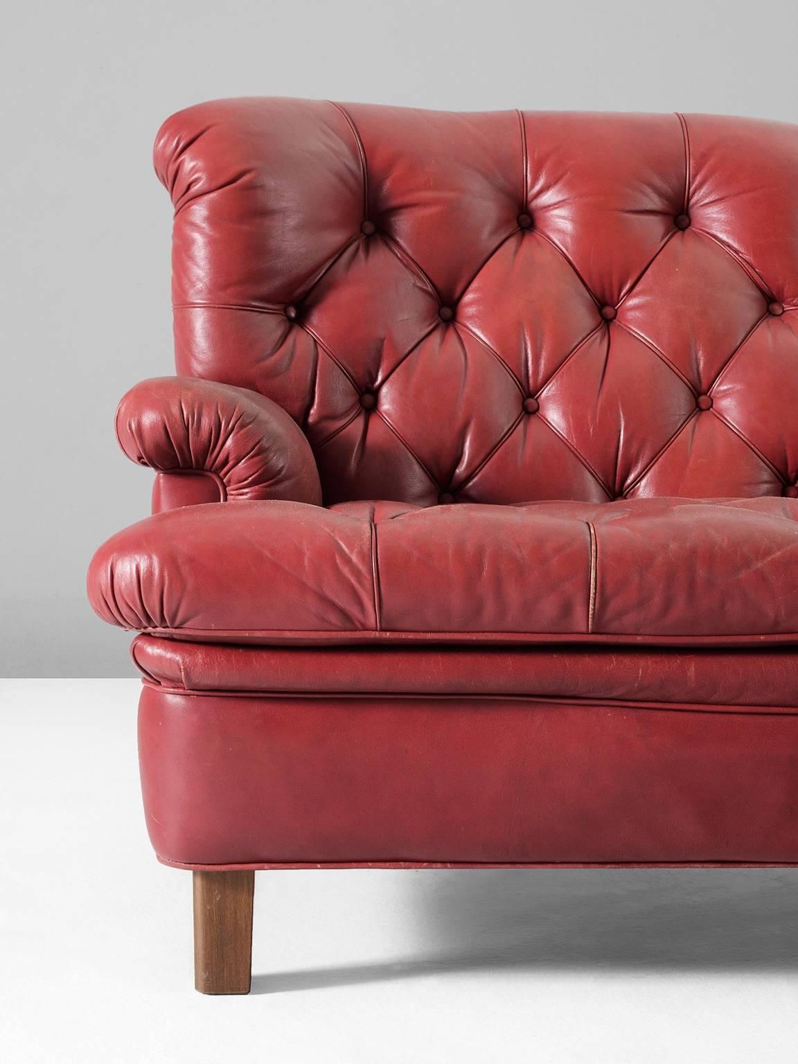 Mid-20th Century Arne Norell Three-Seat Sofa in Patinated Red Leather