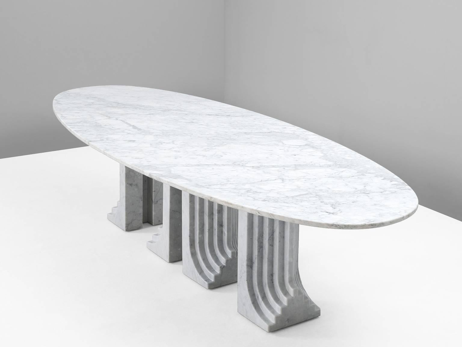 Center table model Samo, in marble, by Carlo Scarpa for Simon, Italy 1970s. 

Large dining table in Carrara marble. This table has four large legs, with beautiful fluting details. Due the lines and material this table is a modern interpretation of