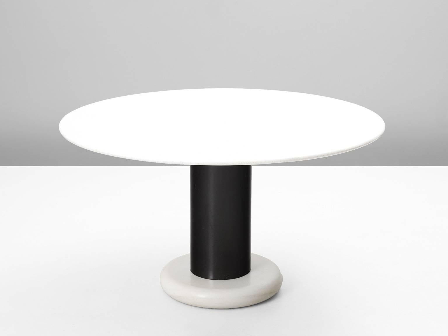 Table, in marble and metal, by Ettore Sottsass for Poltronova, Italy 1965.

Round pedestal table by Italian designer Ettore Sottsass. A white round base with black metal cylindrical column. The round top is executed in beautiful white marble. A