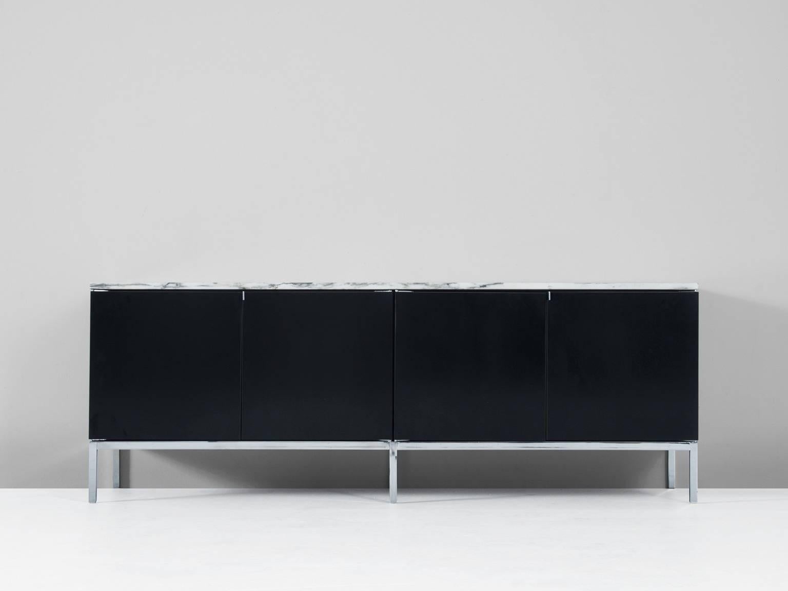 Sideboards, in oak, metal and marble, by Florence Knoll for Knoll International, United States, 1960s. 

Minimalistic credenza with elegant details such as the chromed base and marble top. Equipped with smart storage facilities. This piece gets a
