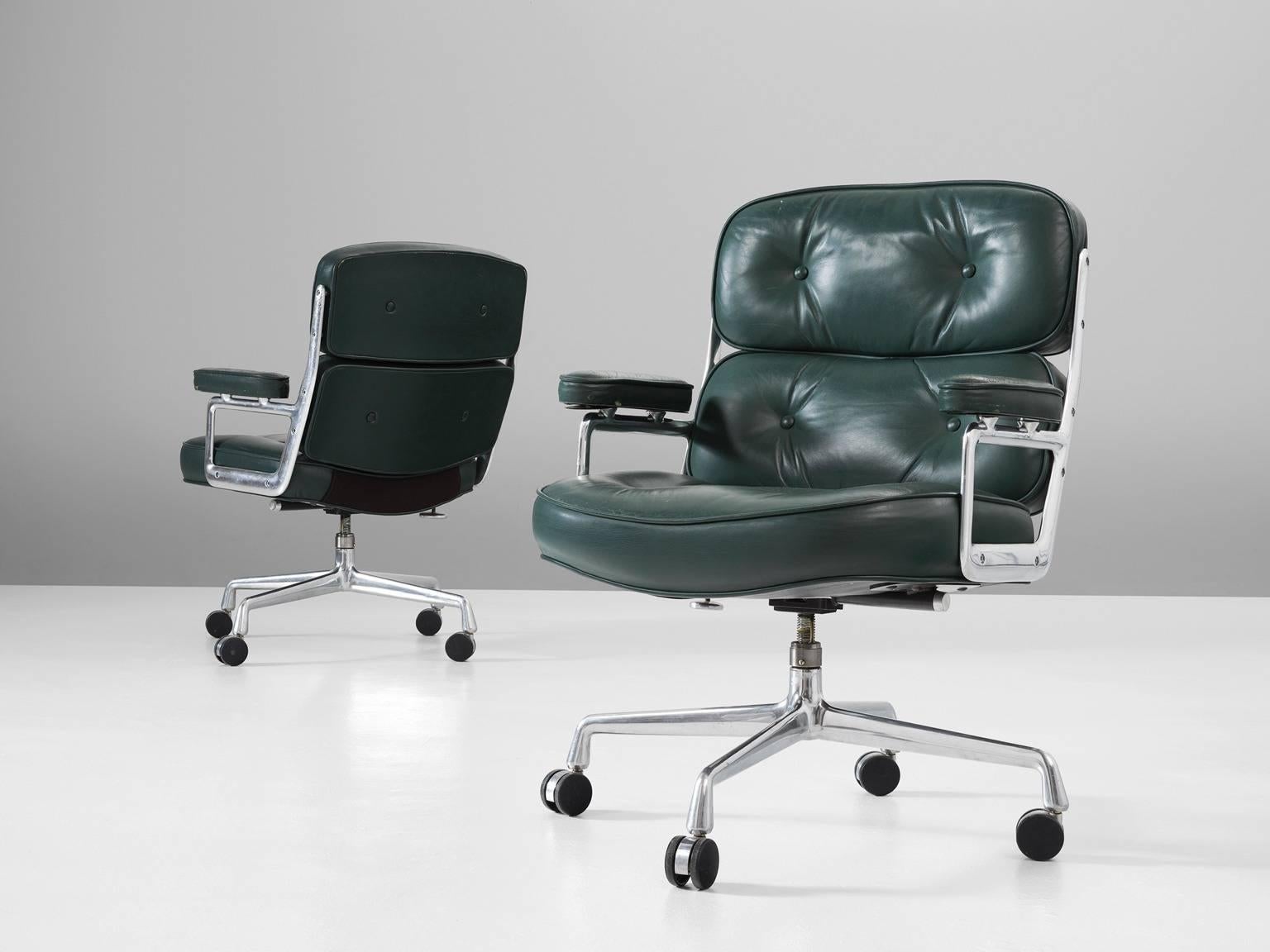 Set of two desk chairs, in leather and metal, by Charles & Ray Eames, United States, 1960.

Classic office chairs by designer couple Charles & Ray Eames. These conference chairs were designed for the Time Life building in New York. A Classic