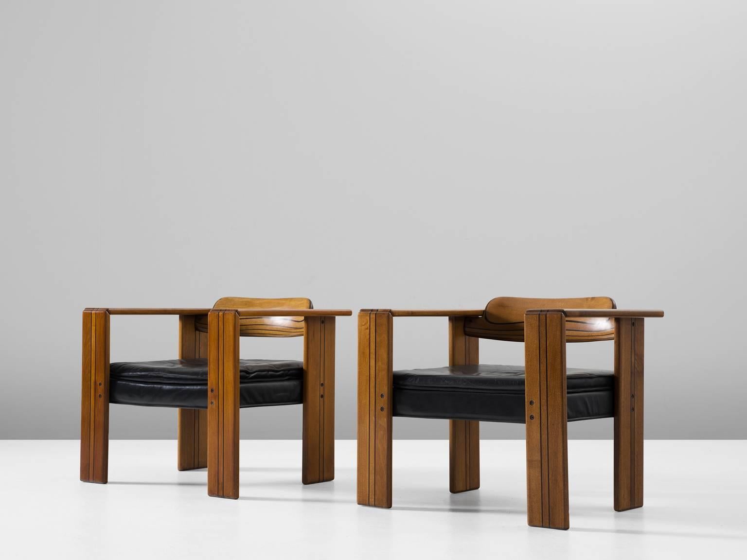 Set of two 'Artona' armchairs, in walnut and leather, by Afra & Tobia Scarpa for Maxalto, Italy, 1975. 

Pair of cubic Artona lounge chairs by Italian designer couple Afra and Tobia Scarpa. These chairs show absolute stunning craftsmanship.