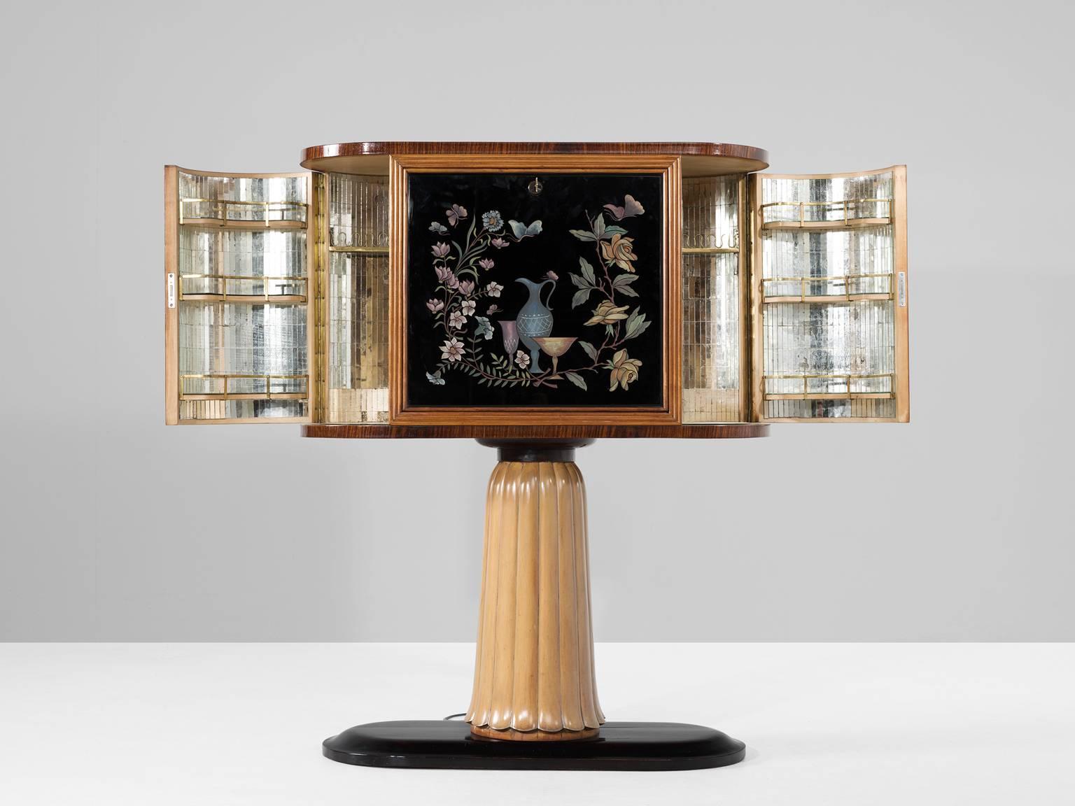 Dry bar, in walnut, brass and glass, designed by Osvaldo Borsani, Italy, circa 1946. 

Elegant Italian cabinet with characteristics of Osvaldo Borsani. The bar consist of an ebonized base with walnut column. The cabinet itself is beautifully