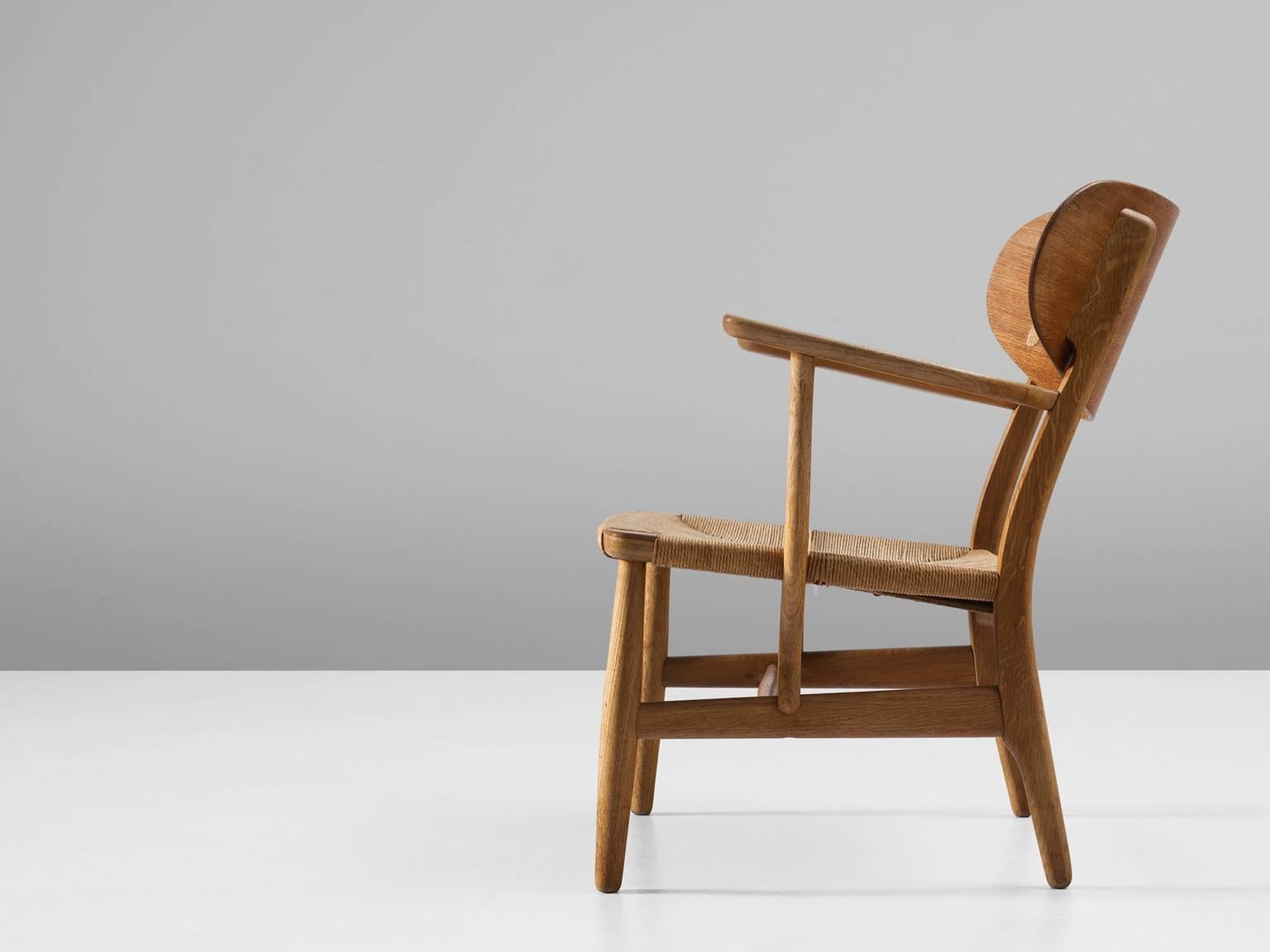 Scandinavian Modern Hans Wegner Early CH22 Lounge Chair in Oak