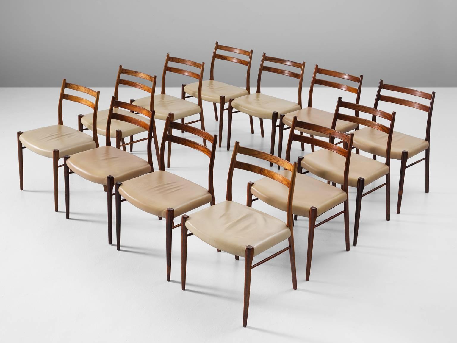 12 chairs model GS710, in rosewood and leather, by Arne Wahl Iversen for Glyngore Stolefabrik, Denmark, 1960s. 

Very elegant set of 12 dining chairs by Danish designer Arne Wahl Iversen. It is highly rare to find a large set of these well