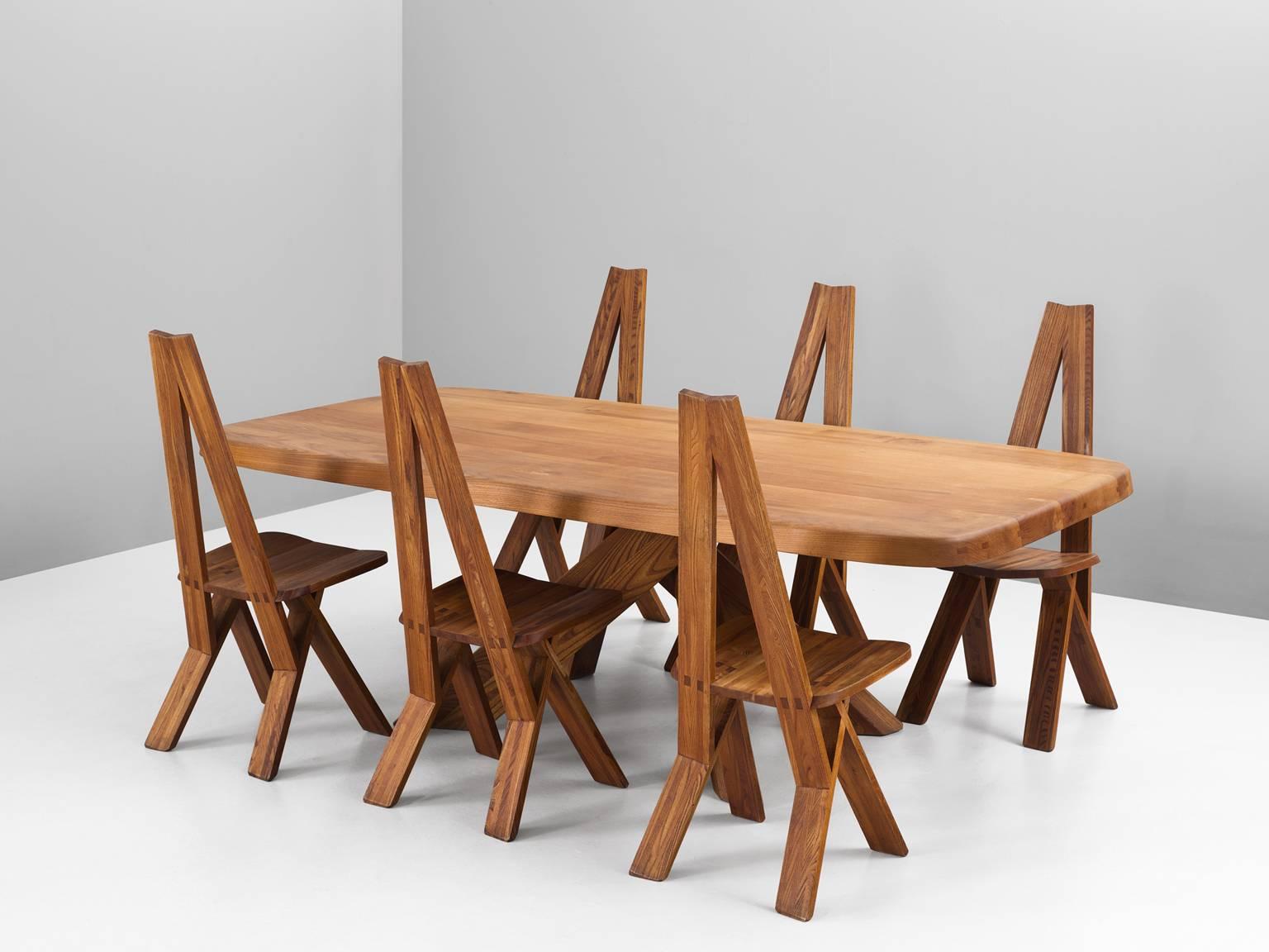 Dining room set, in elm, by Pierre Chapo, France, 1960s.

A highly rare dining room set, consisting of six 'S45' chairs and matching rectangular table model 'T35D.' Well-crafted in solid.

These extraordinary chairs are in excellent condition,