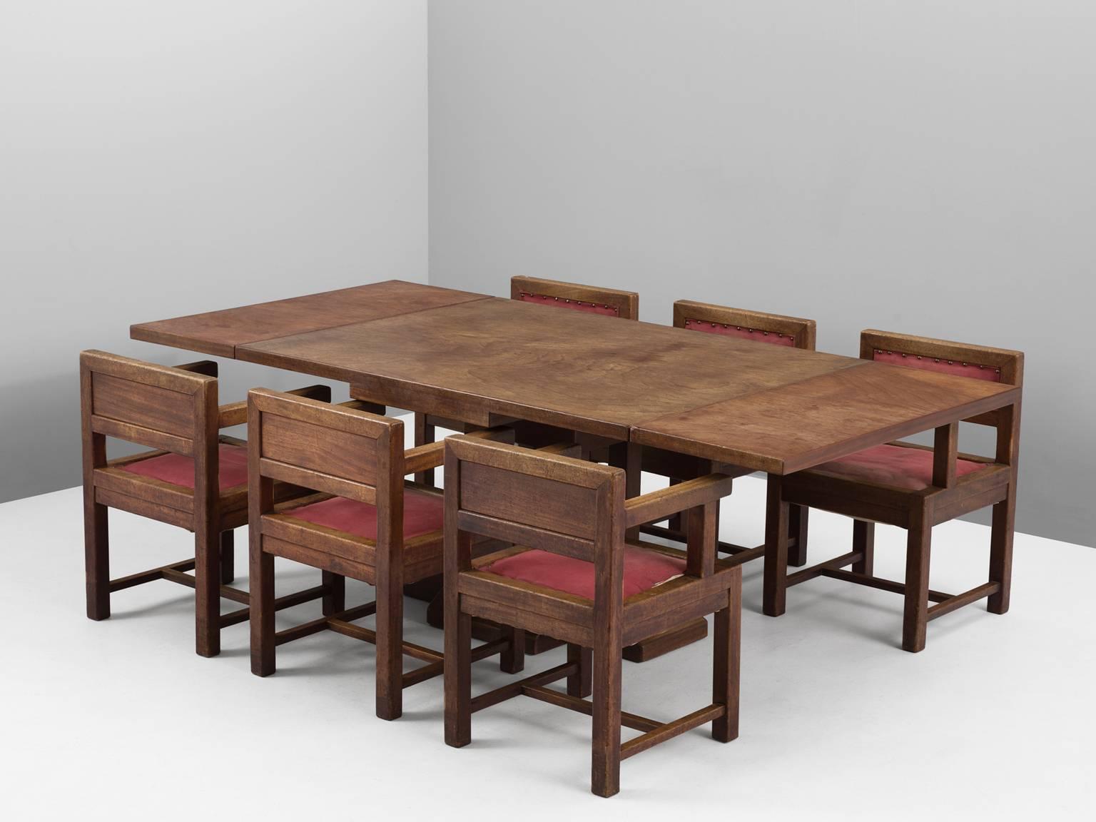 Dining room set, in mahogany and fabric, attributed to Sarah Lipska, France, 1930s.

Art Deco dining room set consisting of one extendable rectangular table and six armchairs. 
The rectangular table shows an interesting architectural base. By the