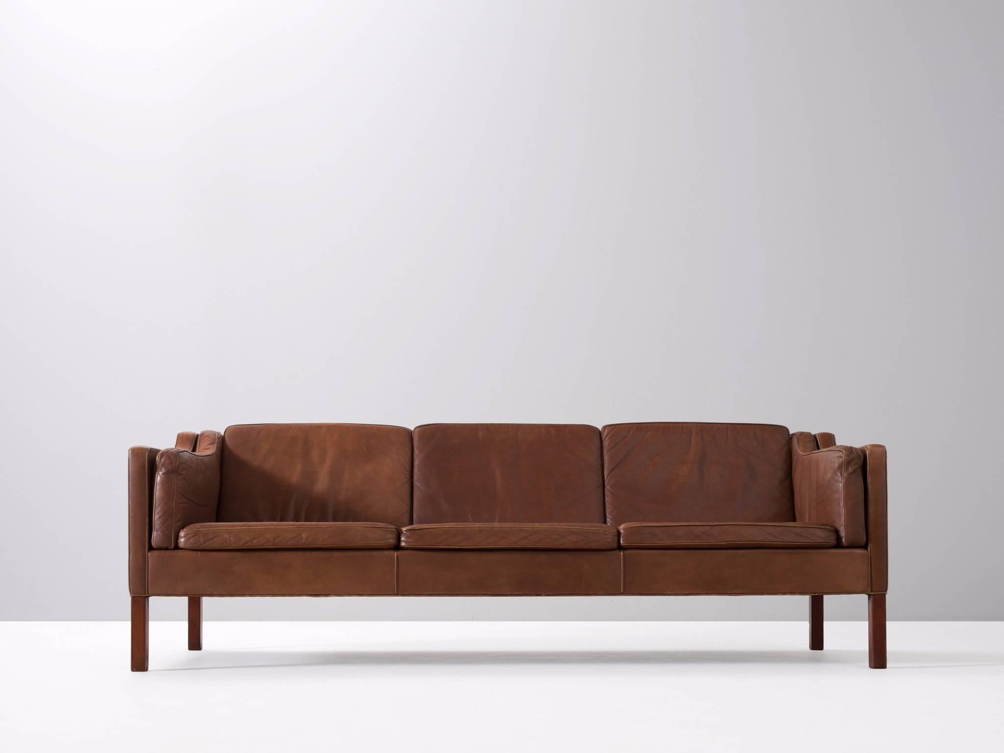 Three-seat sofa leather and oak, by Børge Mogensen for Fredericia Stolefabrik, Denmark 1962. 

Very well conditioned three-seat sofa from Børge Mogensen. This model was designed by Mogensen for his own home, in his goal to create the ultimate sofa.
