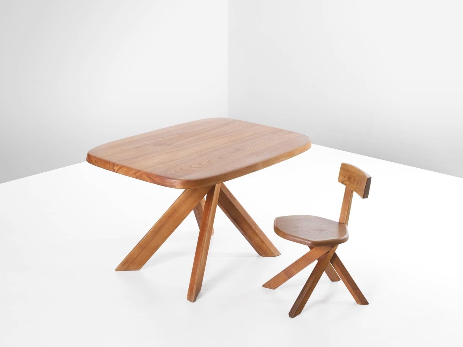 Table T35B and chair S34, in elm, by Pierre Chapo, France, 1960s.

Small dining table and chair. This chair of solid elm shows the characteristics of Pierre Chapo. First of all the material. Second the cross legged base and stunning wood-joints.