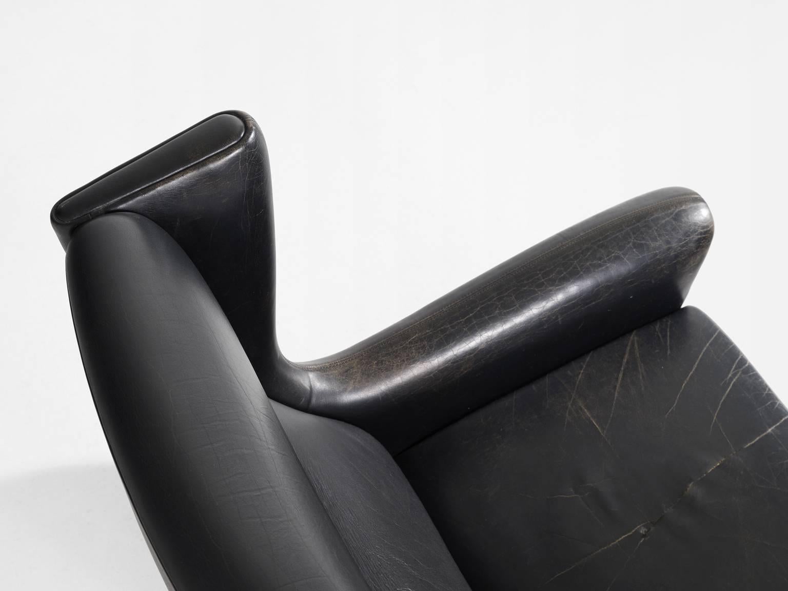 Illum Wikkelsø '110' Lounge Chair in Black Leather and Rosewood 1