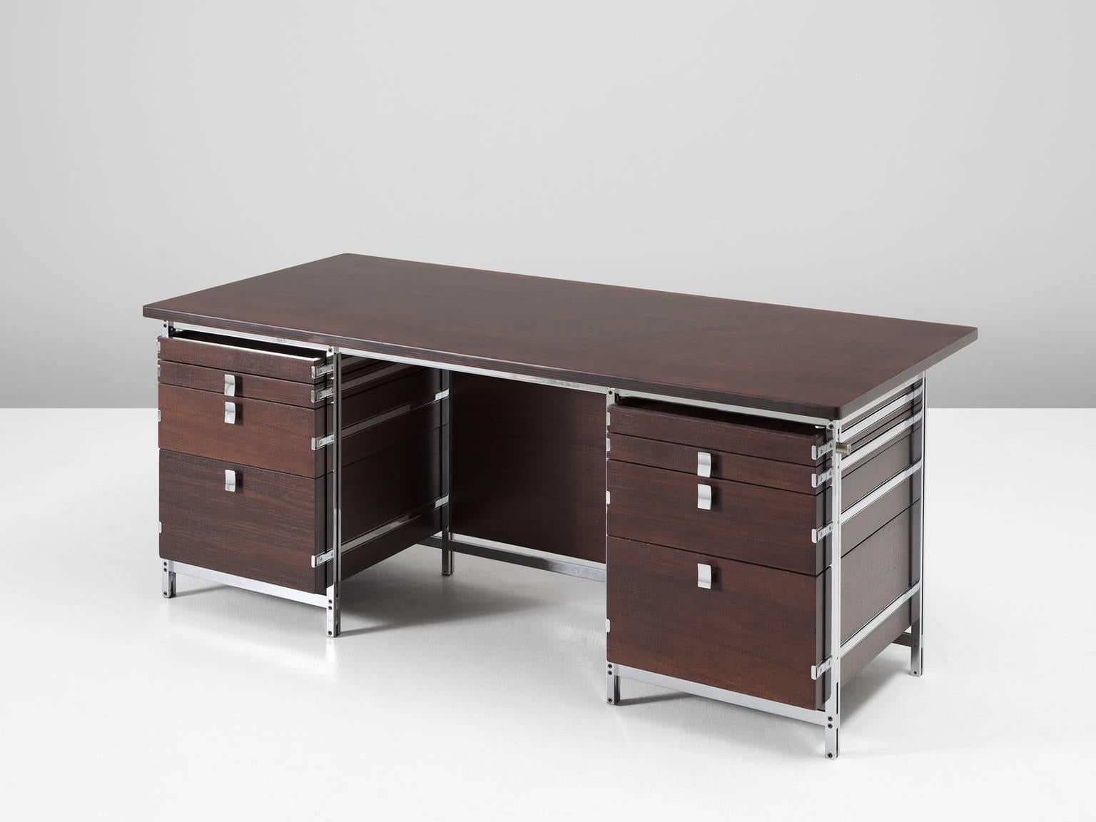Desk, in walnut and chrome plated metal, by Jules Wabbes for Mobilier Universel, Belgium, 1960s. 

Very rare but beautiful designed desk by one of Belgium's most renowned designers Jules Wabbes. His experimental ways of approaching wood and