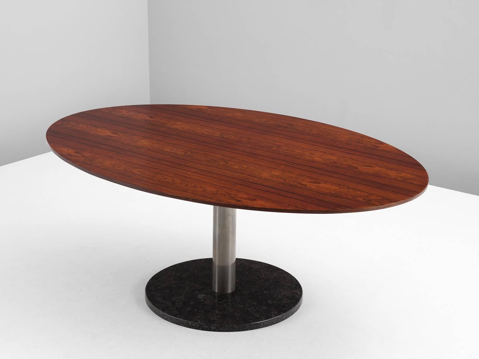 Dining table, in rosewood, metal and marble, by Alfred Hendrickx for Belform, Belgium, 1960s.

Oval rosewood dining room table with magnificent grain in the rosewood veneer on an chromed pedestal with black marble base. This table is designed by