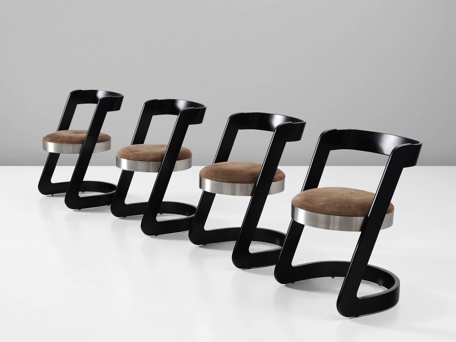 Set of four dining chairs, in wood, metal and upholstery, by Willy Rizzo for Mario Sabot, Italy 1970s. 

Set of four cantilevered chairs in black lacquered bentwood. These chairs have a round base of brushed metal. The frame consist of two