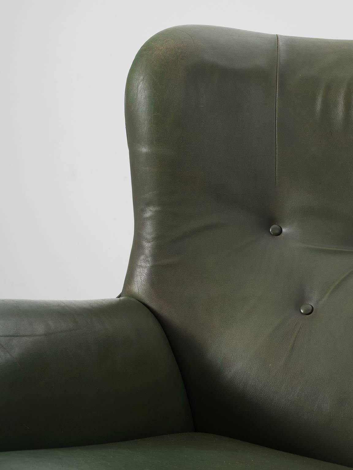 Mid-20th Century Illum Wikkelsø Green Leather Swivel Lounge Chair